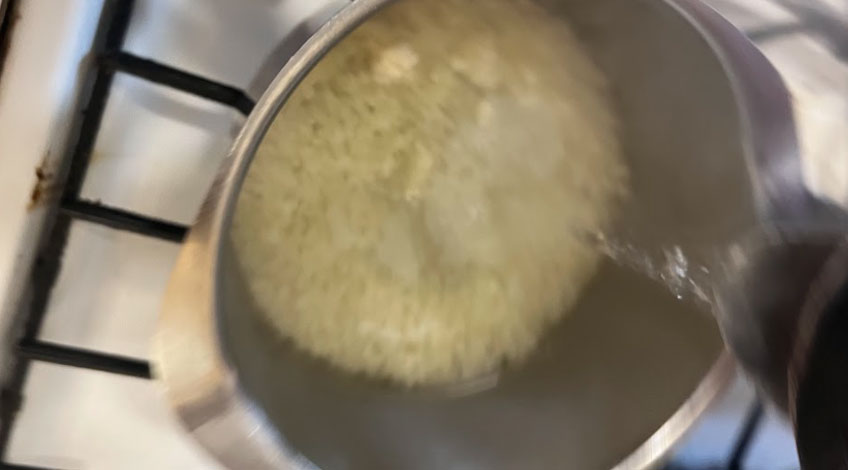 pour boiling water over cauliflower rice