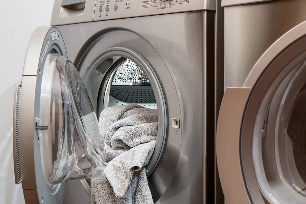 washing machine with a towel in the door