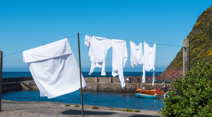 white laundry on clothes line