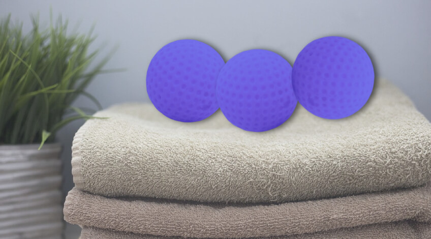 laundry balls on top of towels