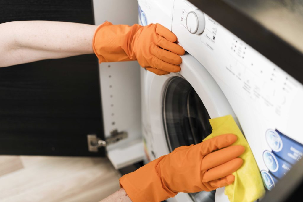 cleaning washing machine exterior