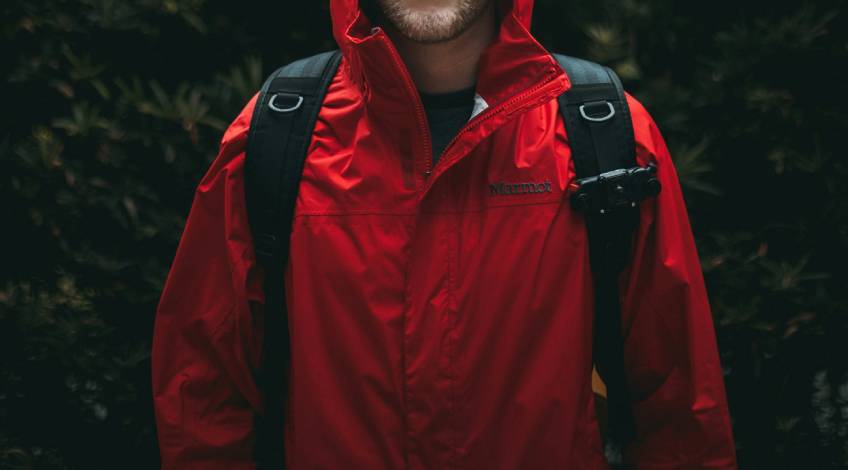 person wearing a rain jacket