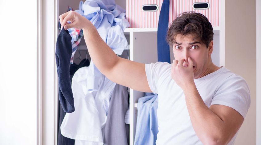 If Your Clothes Smell After Washing, You're Making This Vital Mistake