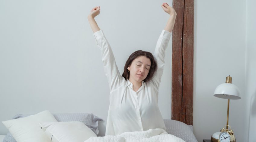 sleepy woman waking up