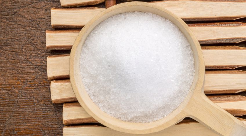 epsom salts in a wooden scoop