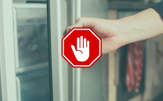 Why Your Freezer Door Keeps Popping Open (And How To Stop It)
