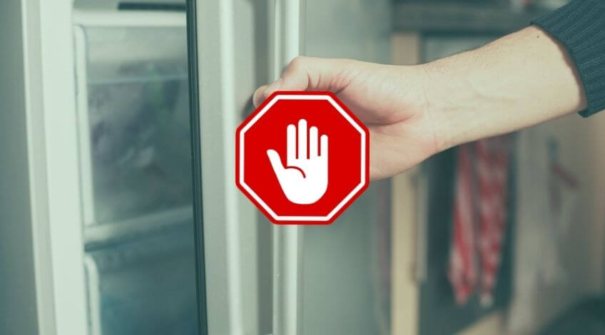 Why Your Freezer Door Keeps Popping Open (And How To Stop It)