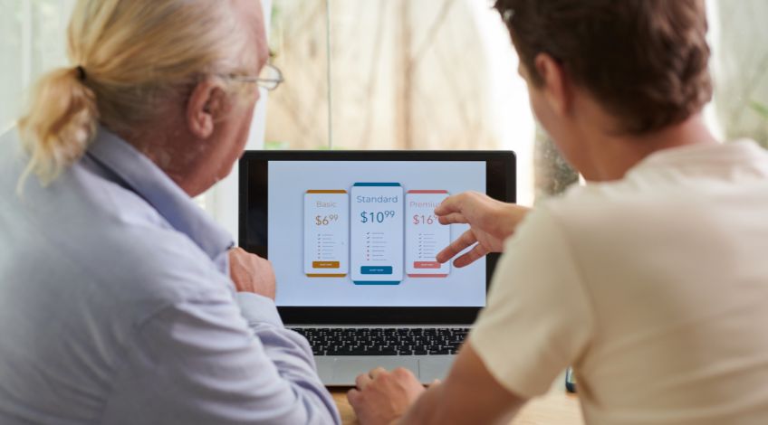 two men discussing online subscription payments